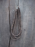 Graduated Brass Bead Necklace with an Antique Copper Finish