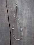 White Clay Beaded Necklace with Graduated Antique Copper-Finish Brass Beads